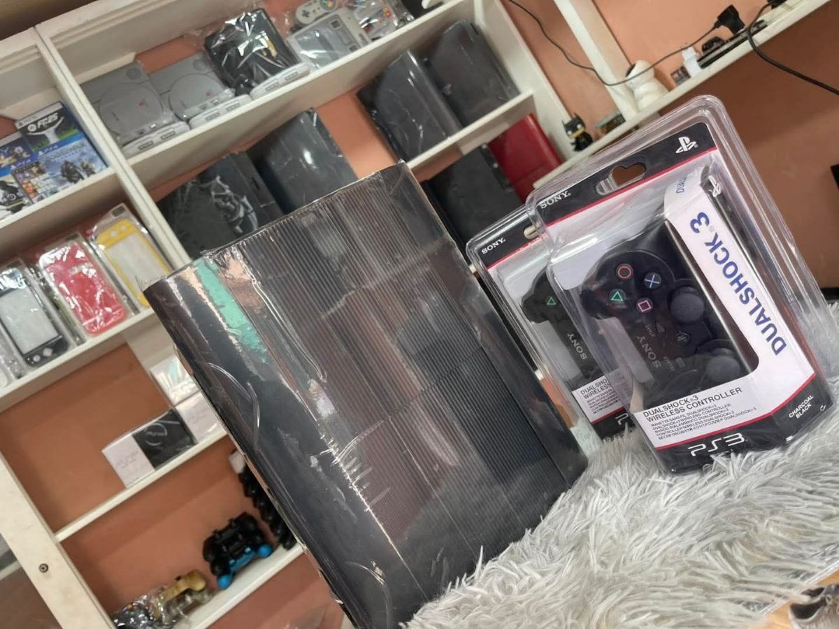 PS3 Slim quasi neuve Craquer avec 20 jeux - photo 2